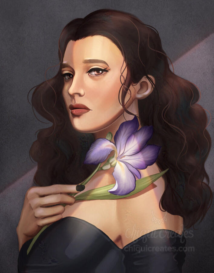 Mixed race woman with thick, curly dark brown hair and with a forlorn look. She is holding an iris flower.